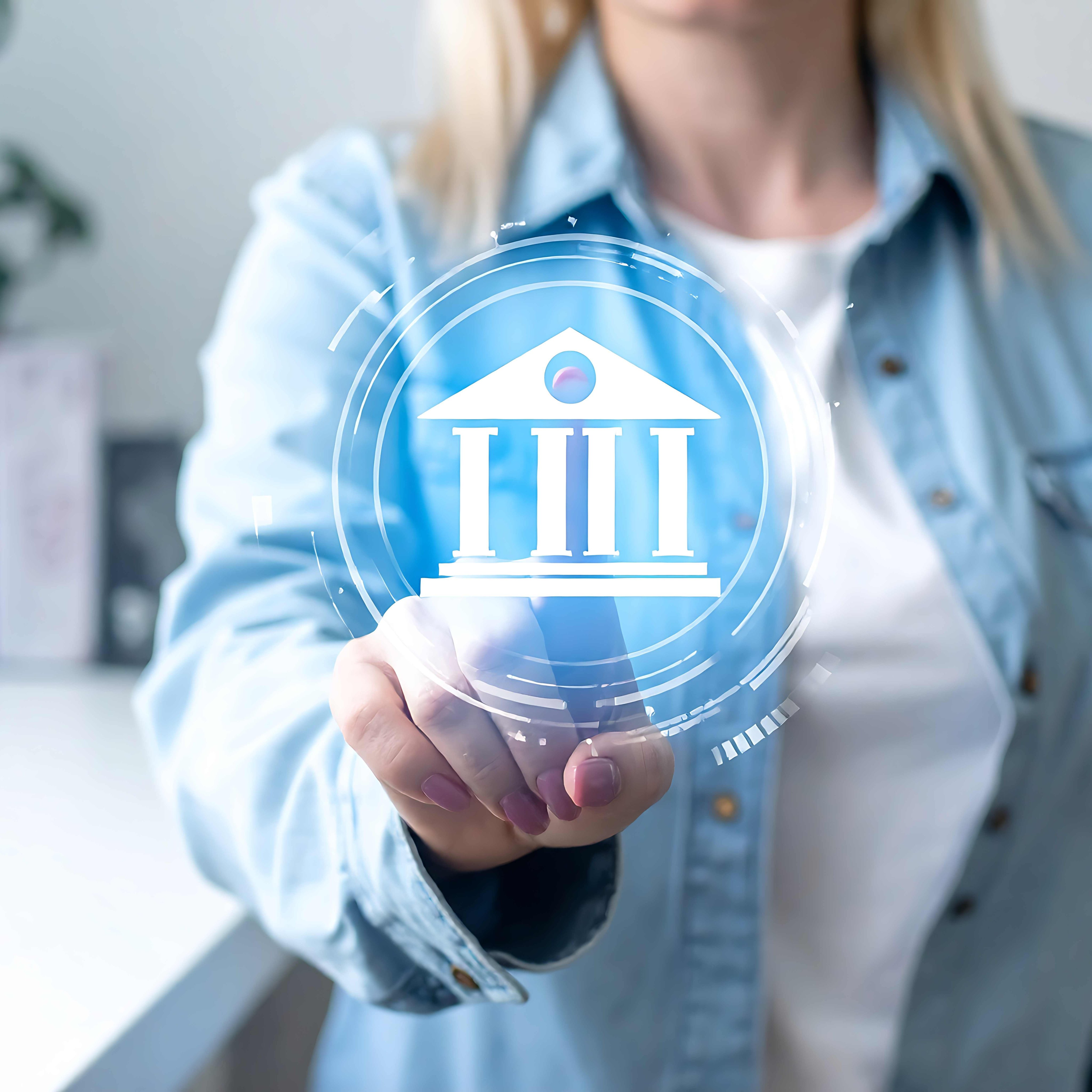 Image of a woman touching digital screen with a building icon representing government